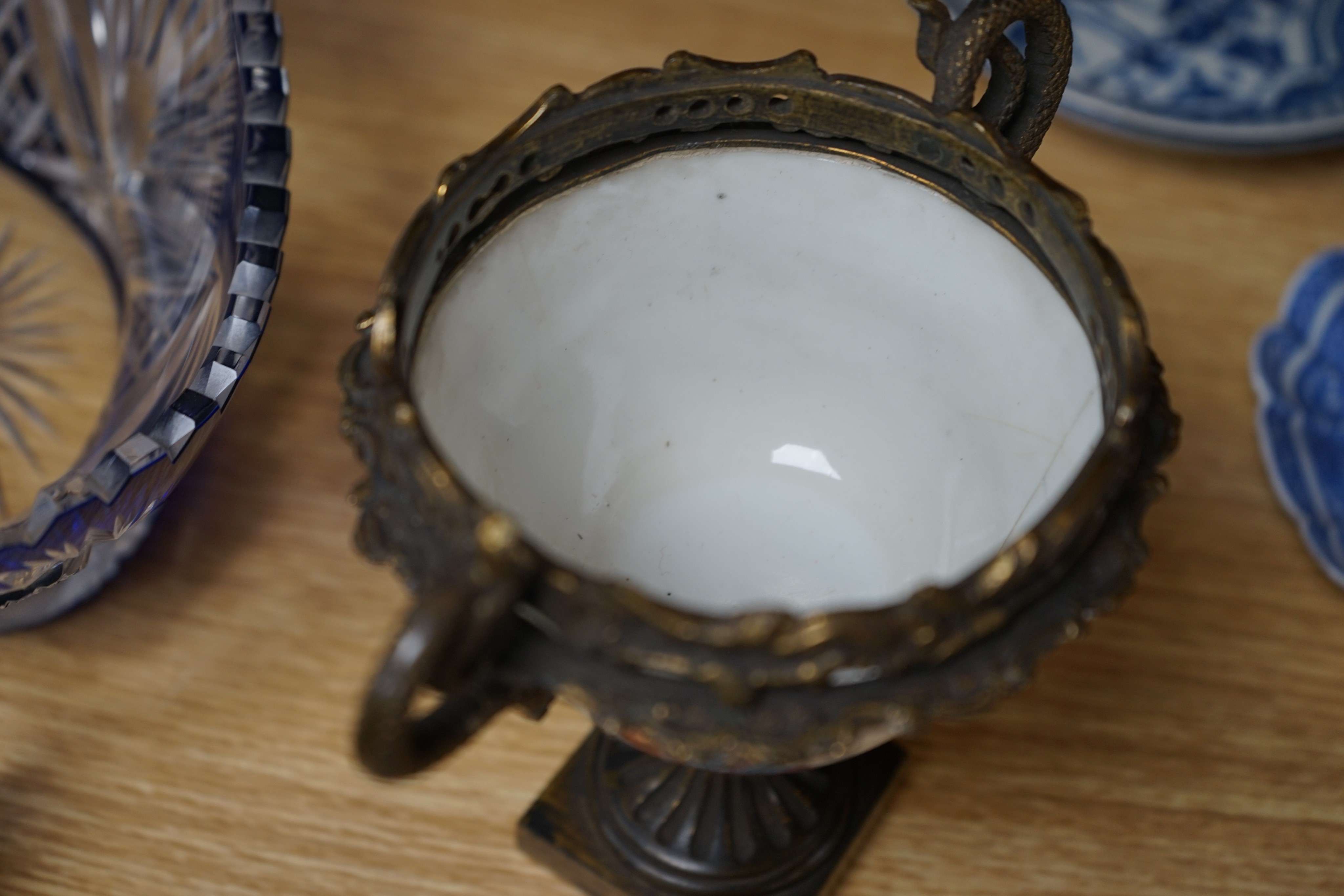 Two cut glass bowls and a Chinese brass mounted cup, 16cm